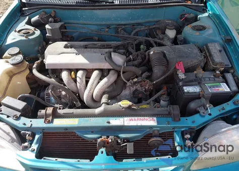 1999 Toyota Corolla Le z USA, uszkodzony, nr VIN 2T1BR12E2XC208457